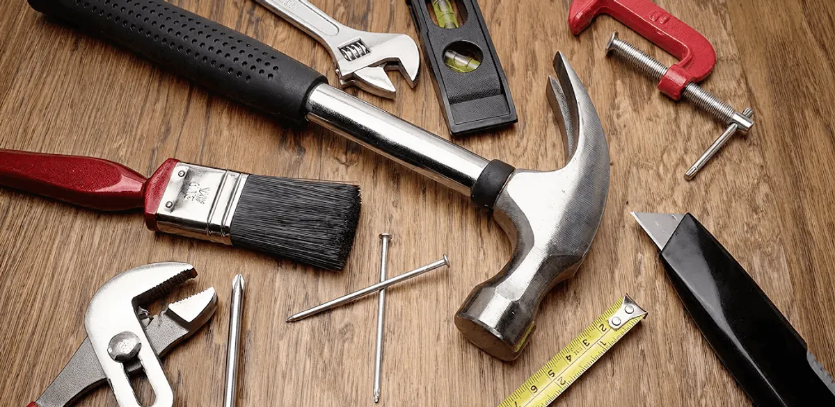 Handyman tools laid out for home repair and maintenance work in Indianapolis, IN